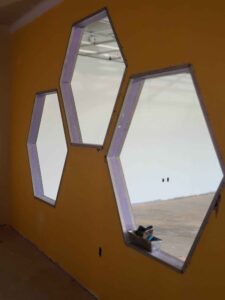 New drywall hung on interior wall framing